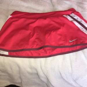 Reddish pink Nike tennis skirt